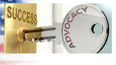 Advocacy and success on a key in lock.