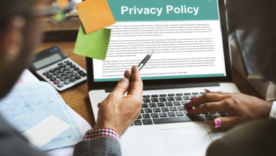 Privacy policy being reviewed on a laptop.